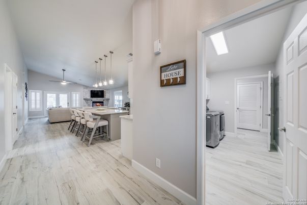 Dining room, Interior, Kitchen, Pendant Lights, Washer, Wood Texture Flooring