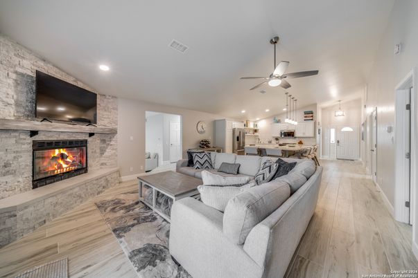 Dining room, Fireplace, Interior, Kitchen, Living room, Pendant Lights, Recessed Lighting, Stone Walls, Wood Texture Flooring