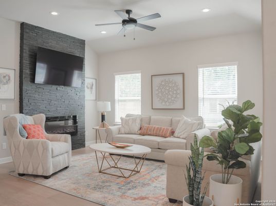 Fireplace, Interior, Living room, Recessed Lighting, Stone Walls, Wood Texture Flooring