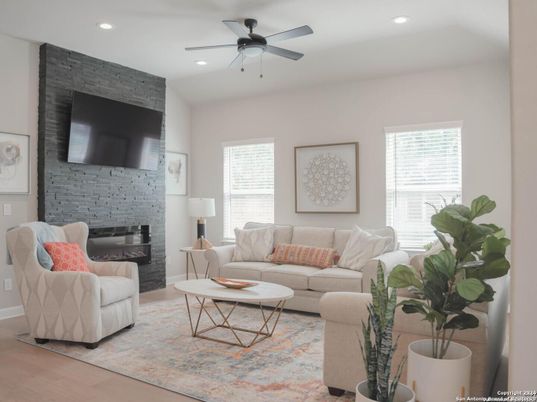 Fireplace, Interior, Living room, Recessed Lighting, Stone Walls, Wood Texture Flooring