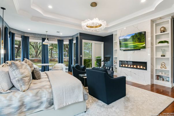 Bedroom, Fireplace, Interior, Living room, Pendant Lights, Recessed Lighting, Wood Texture Flooring