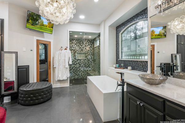 Bathroom, Chandelier, Dual Sink Vanities, Free Standing Baths, Glass Shower, Interior, Pendant Lights, Recessed Lighting