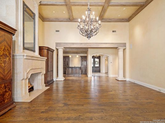 Chandelier, Fireplace, Interior, Recessed Lighting, Wooden Beams, Wood Texture Flooring