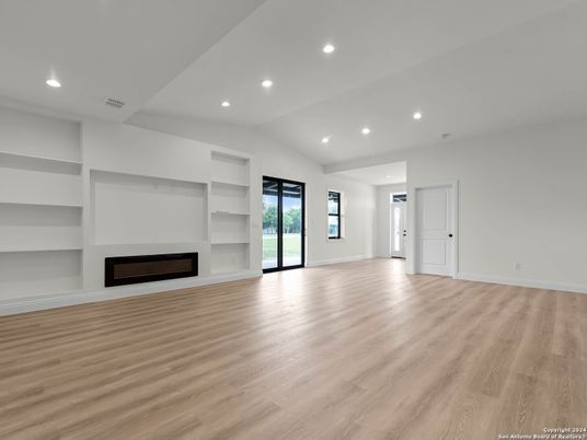 Empty room, Fireplace, Interior, Recessed Lighting, Wood Texture Flooring
