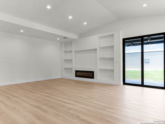 Empty room, Fireplace, Interior, Recessed Lighting, Wood Texture Flooring