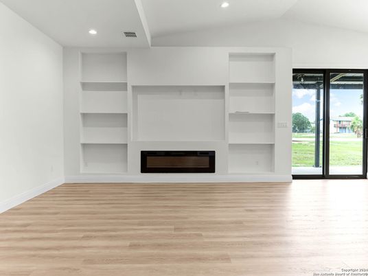 Empty room, Fireplace, Interior, Recessed Lighting, Wood Texture Flooring