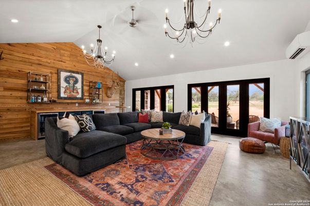 Chandelier, Fireplace, Interior, Living room, Recessed Lighting, Wooden Walls