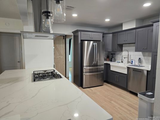 Interior, Kitchen, Pendant Lights, Recessed Lighting, Stainless Steel Appliances, Wood Texture Flooring