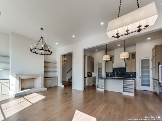 Chandelier, Interior, Kitchen, Pendant Lights, Recessed Lighting, Stainless Steel Appliances, Wood Texture Flooring
