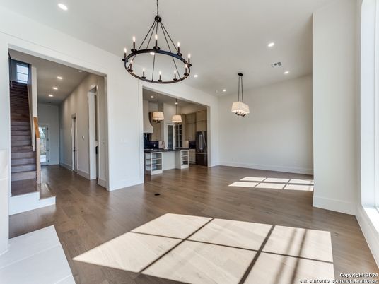 Chandelier, Interior, Kitchen, Pendant Lights, Recessed Lighting, Stainless Steel Appliances, Wood Texture Flooring