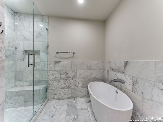 Bathroom, Free Standing Baths, Glass Shower, Interior, Marble, Marble Walls, Recessed Lighting