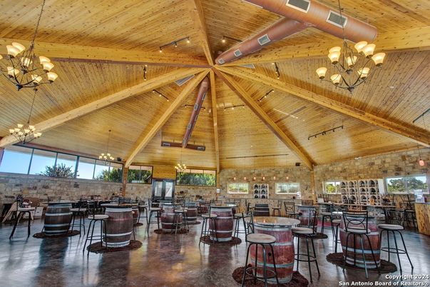 Chandelier, Dining room, Interior, Kitchen, Pendant Lights, Recessed Lighting, Stone Walls, Wooden Beams, Wooden Ceilings
