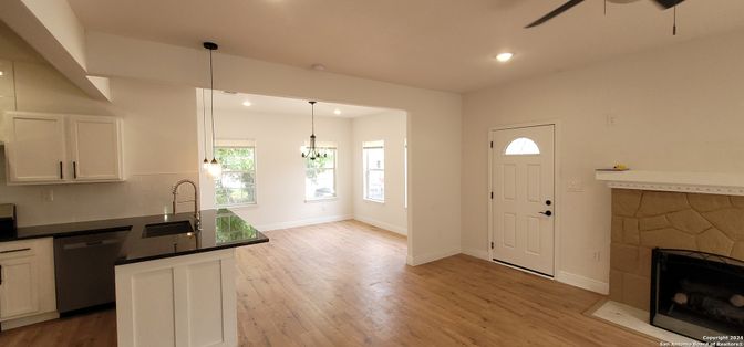 Fireplace, Interior, Kitchen, Pendant Lights, Recessed Lighting, Wood Texture Flooring