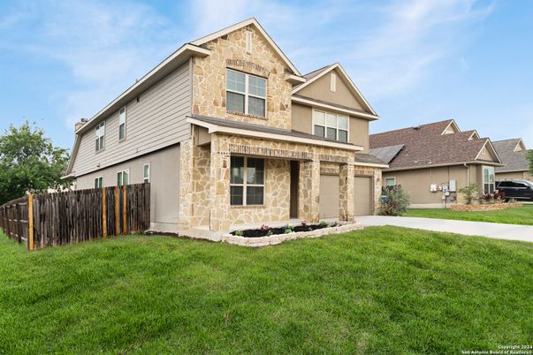 Attached, Exterior, Facade, Solar Panels, Brick Traditional