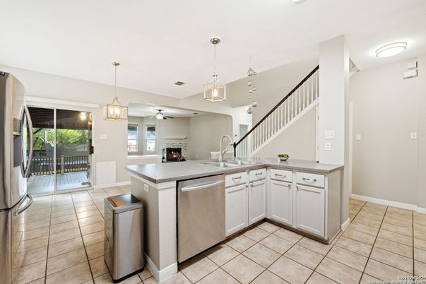 Fireplace, Interior, Kitchen, Pendant Lights, Stainless Steel Appliances