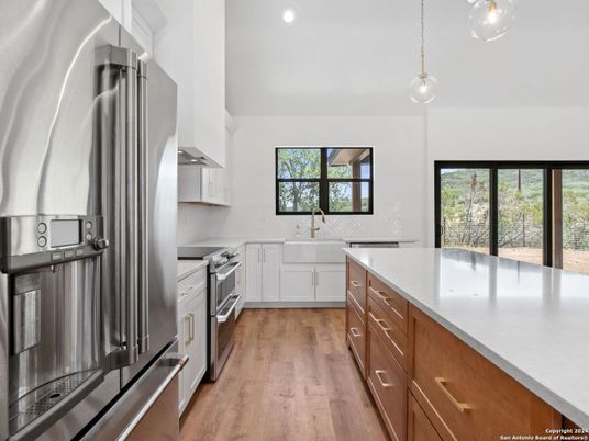 Interior, Kitchen, Pendant Lights, Recessed Lighting, Stainless Steel Appliances, Wood Texture Flooring