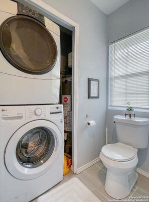 Bathroom, Interior, Utility Closets, Washer, Wood Texture Flooring