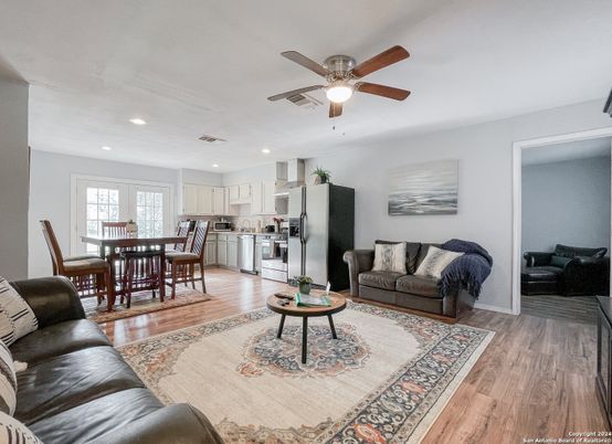 Dining room, Interior, Kitchen, Living room, Recessed Lighting, Stainless Steel Appliances, Wood Texture Flooring