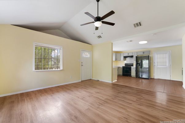 Empty room, Interior, Kitchen, Stainless Steel Appliances, Wood Texture Flooring