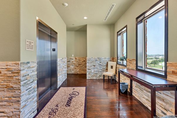Elevator, Interior, Recessed Lighting, Wood Texture Flooring