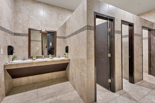 Bathroom, Dual Sink Vanities, Interior, Recessed Lighting, Stone Walls
