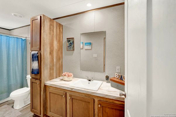 Bathroom, Interior, Recessed Lighting, Tile Countertops, Wood Texture Flooring