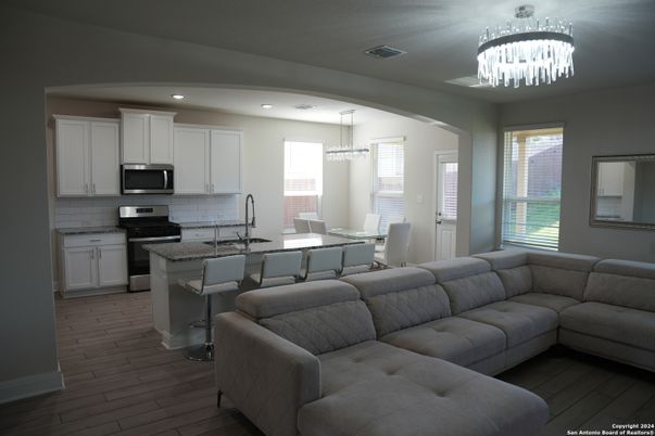Chandelier, Dining room, Interior, Kitchen, Living room, Recessed Lighting, Wood Texture Flooring