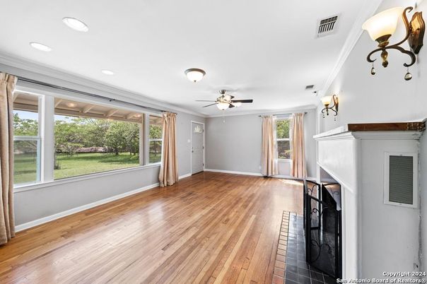 Empty room, Fireplace, Interior, Recessed Lighting, Wood Texture Flooring
