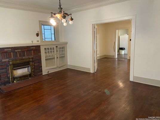 Empty room, Fireplace, Interior, Pendant Lights, Wood Texture Flooring