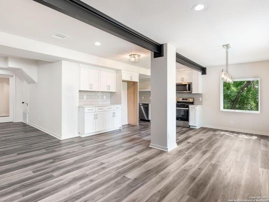Chandelier, Interior, Kitchen, Pendant Lights, Recessed Lighting, Stainless Steel Appliances, Wood Texture Flooring