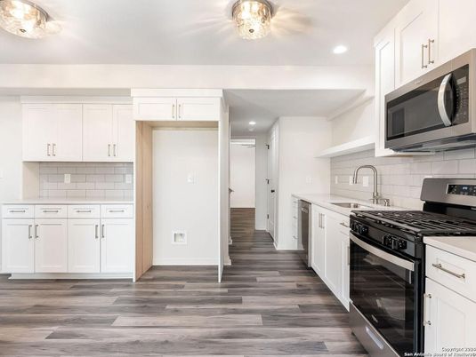Interior, Kitchen, Recessed Lighting, Stainless Steel Appliances, Wood Texture Flooring