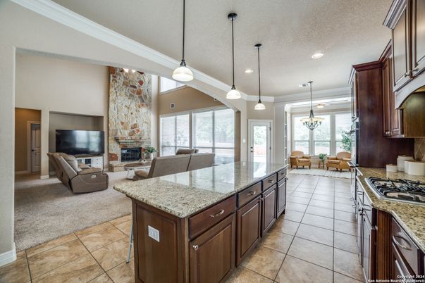 Chandelier, Dining room, Fireplace, Interior, Kitchen, Living room, Pendant Lights, Recessed Lighting