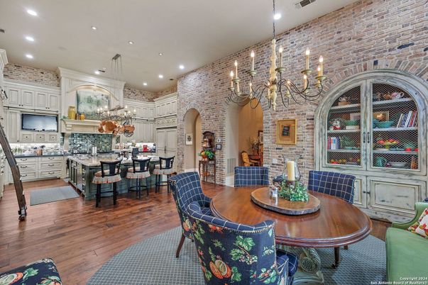 Chandelier, Dining room, Interior, Kitchen, Recessed Lighting, Stone Walls, Wood Texture Flooring