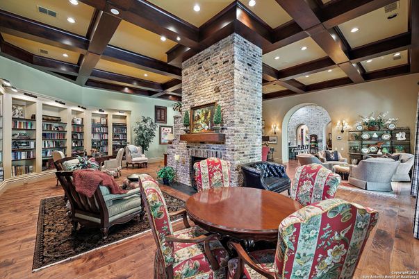 Dining room, Fireplace, Interior, Living room, Recessed Lighting, Stone Walls, Wooden Beams, Wood Texture Flooring