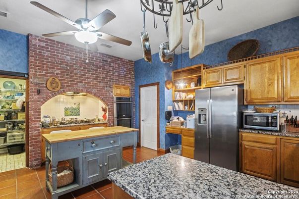 Interior, Kitchen, Stainless Steel Appliances, Stone Walls