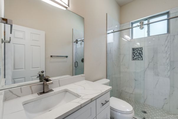 Bathroom, Dual Sink Vanities, Glass Shower, Interior, Marble Walls