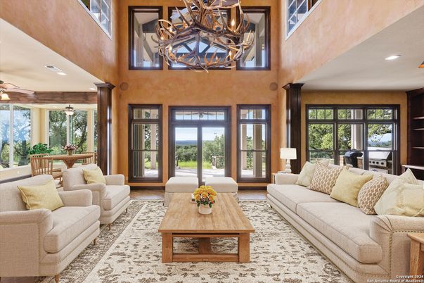 Chandelier, Dining room, Interior, Living room, Piano, Recessed Lighting, Wood Texture Flooring