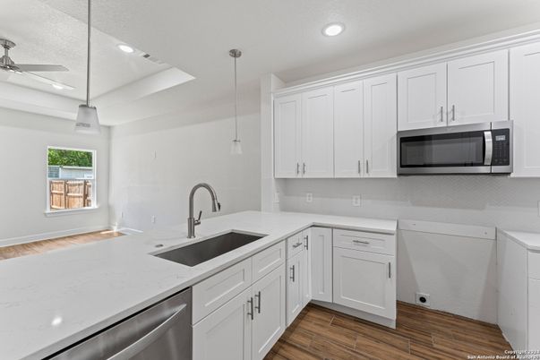 Interior, Kitchen, Pendant Lights, Recessed Lighting, Stainless Steel Appliances, Wood Texture Flooring