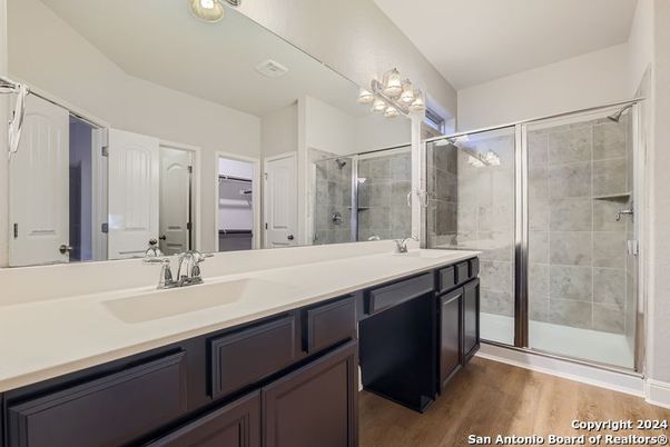 Bathroom, Dual Sink Vanities, Glass Shower, Interior, Wood Texture Flooring