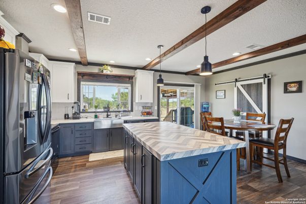 Dining room, Interior, Kitchen, Pendant Lights, Recessed Lighting, Stainless Steel Appliances, Wooden Beams, Wood Texture Flooring
