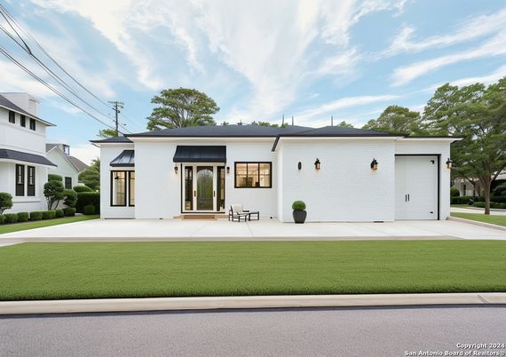 Attached, Exterior, Facade, Spanish Mediterranean