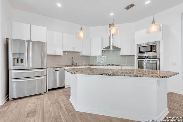 Interior, Kitchen, Pendant Lights, Recessed Lighting, Stainless Steel Appliances, Wood Texture Flooring