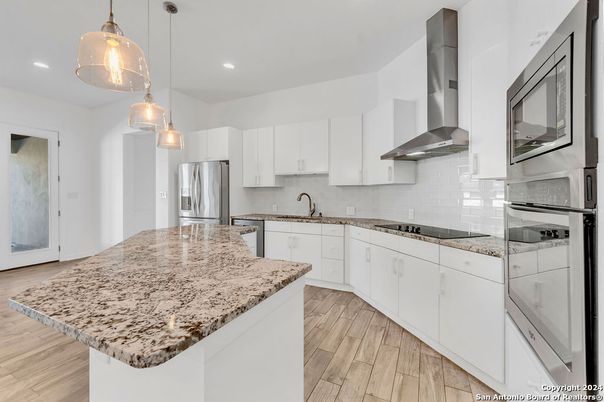 Interior, Kitchen, Pendant Lights, Recessed Lighting, Stainless Steel Appliances, Wood Texture Flooring