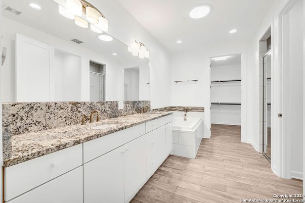 Bathroom, Dual Sink Vanities, Interior, Recessed Lighting, Wood Texture Flooring