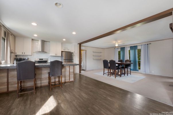 Dining room, Interior, Kitchen, Recessed Lighting, Stainless Steel Appliances, Wood Texture Flooring