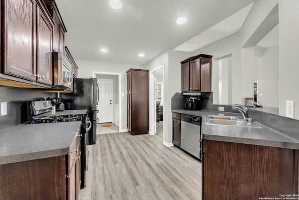Interior, Kitchen, Recessed Lighting, Stainless Steel Appliances, Wood Texture Flooring