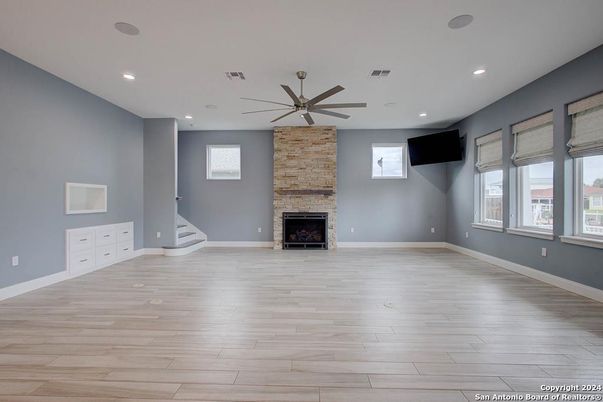 Empty room, Fireplace, Interior, Recessed Lighting, Wood Texture Flooring
