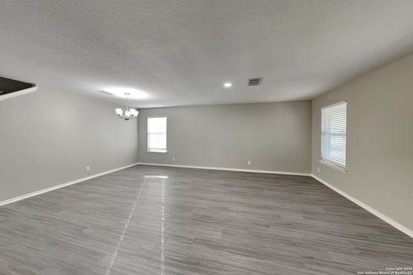 Chandelier, Empty room, Interior, Recessed Lighting, Wood Texture Flooring