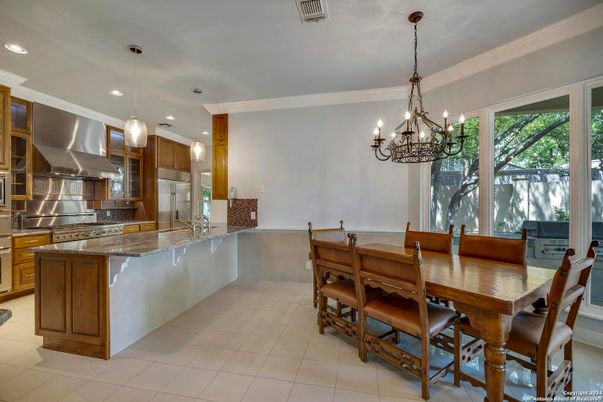 Chandelier, Dining room, Interior, Kitchen, Pendant Lights, Recessed Lighting, Stainless Steel Appliances