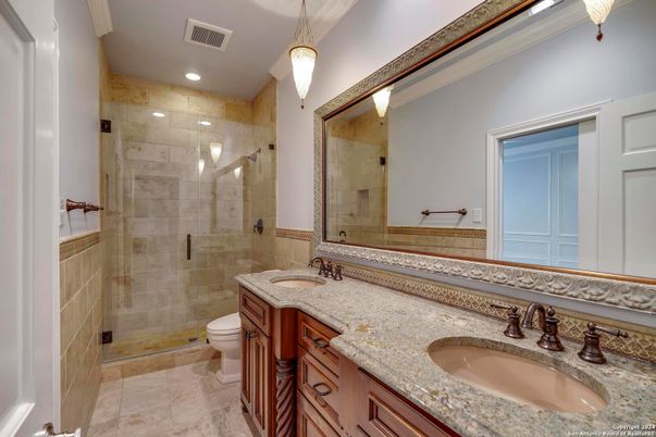 Bathroom, Dual Sink Vanities, Glass Shower, Interior, Pendant Lights, Recessed Lighting